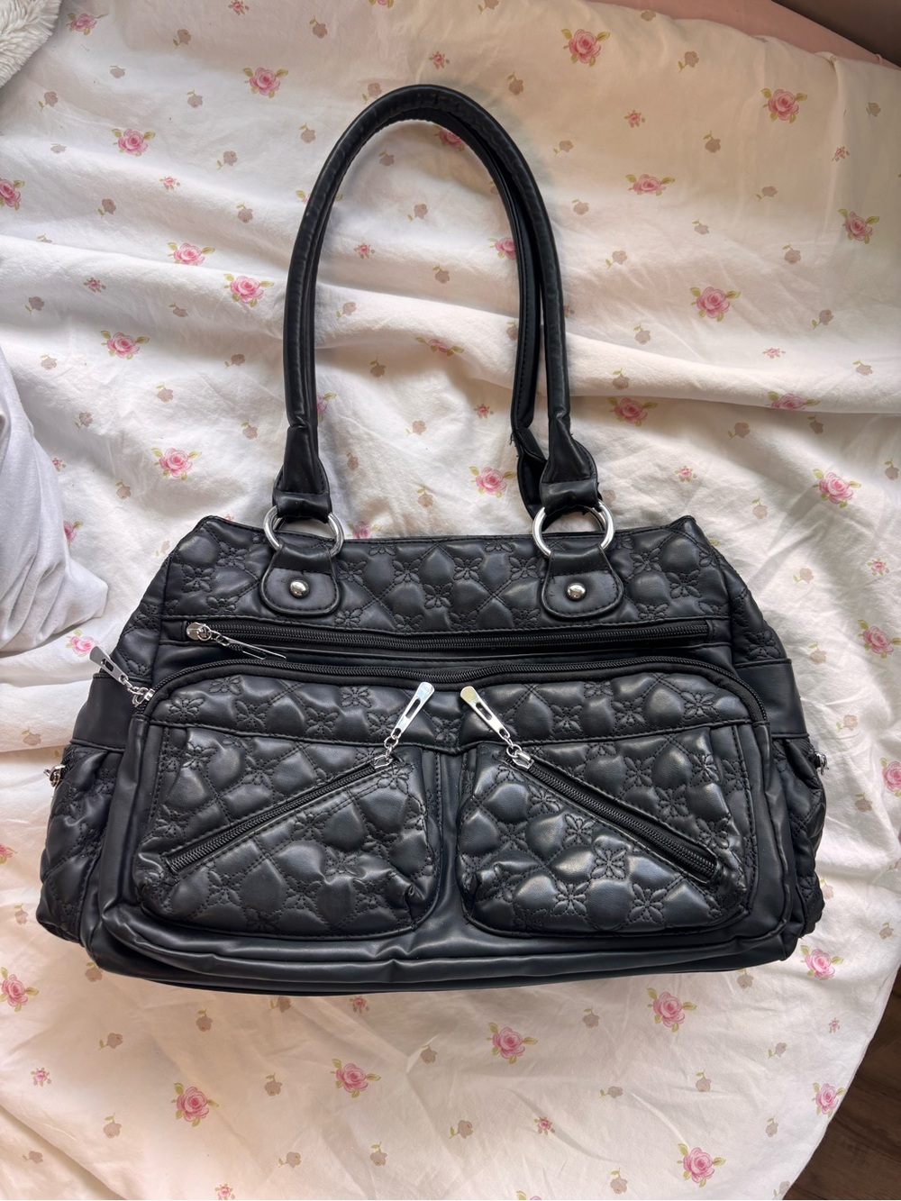 Black Quilted Shoulder Bag with Floral Embossed Pattern